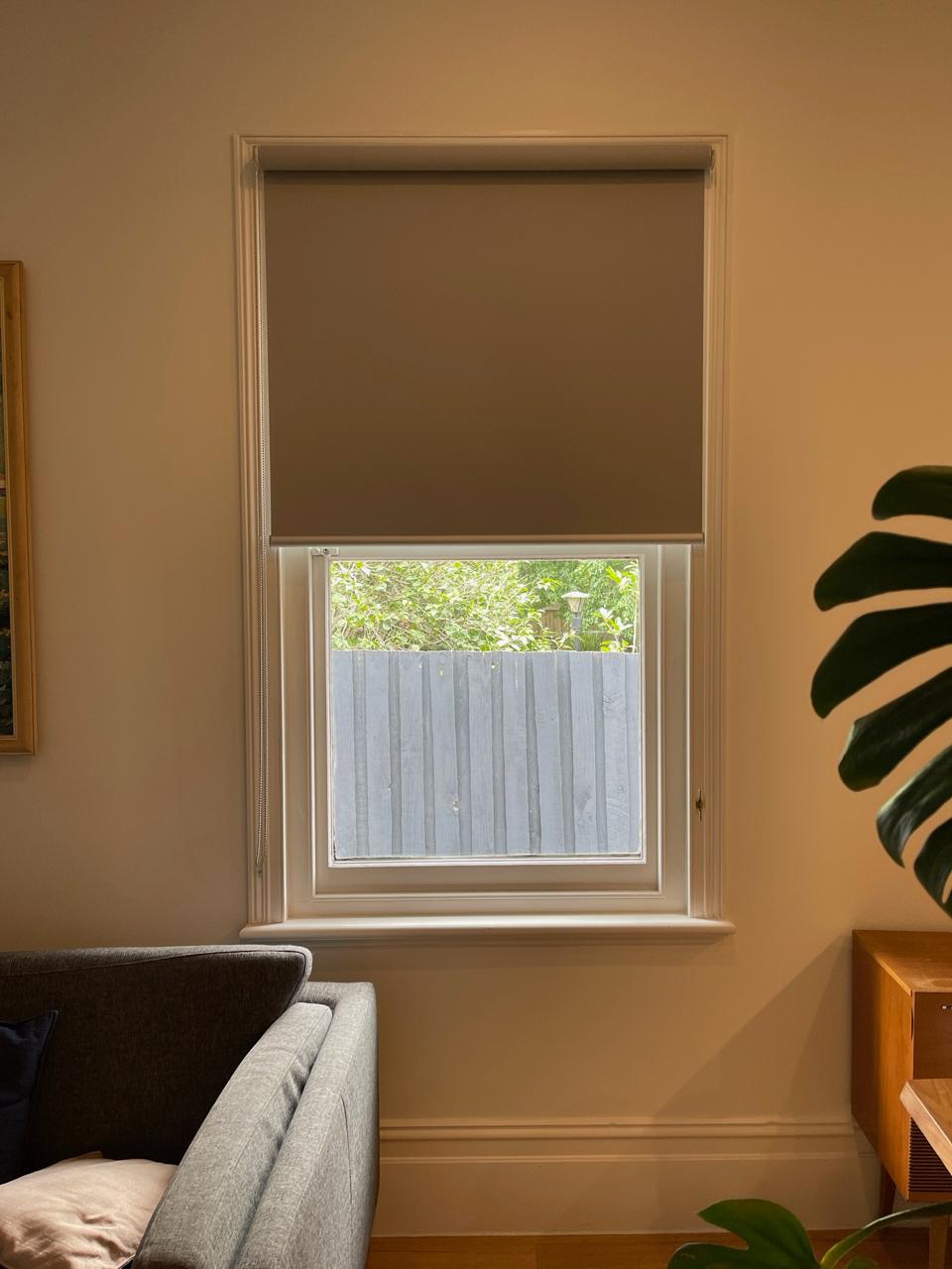 Single roller blockout blind installed in Melbourne living room — We Inspire Blinds
